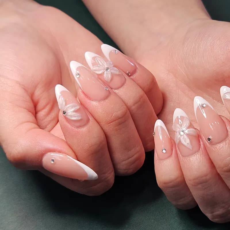 Solar nails, 3D, Y2K, gems, French by Unlimited Nail Systems in Sugar Land, TX